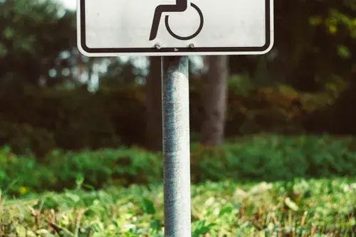 Sign of a person in a wheel chair