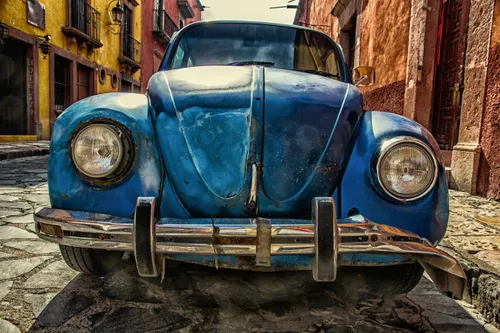 Old blue Volkswagen Bug.